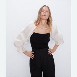 Knit top with puff sleeve